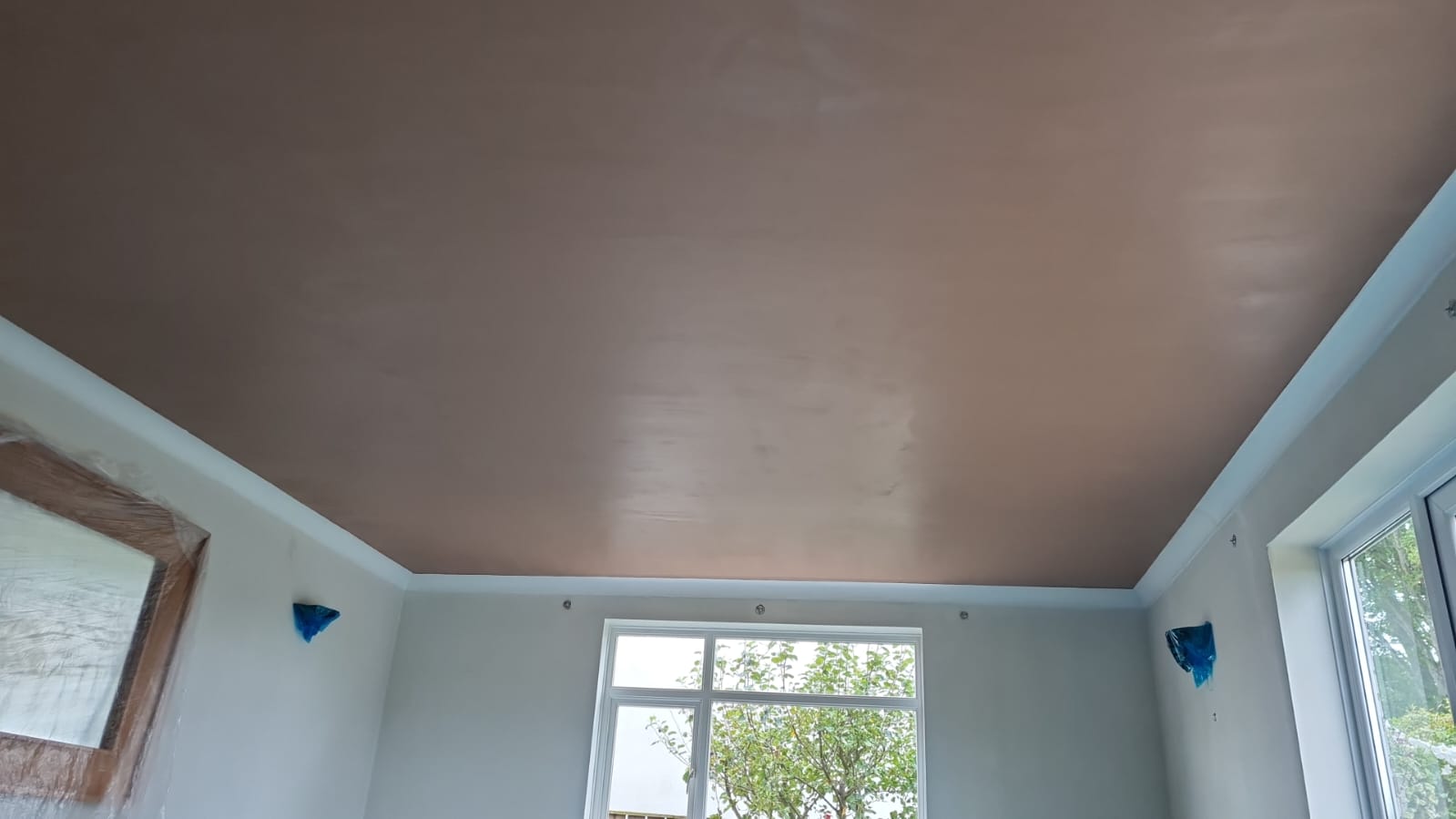 MSP Plastering Solutions preparing wall with new plaster for flawless results